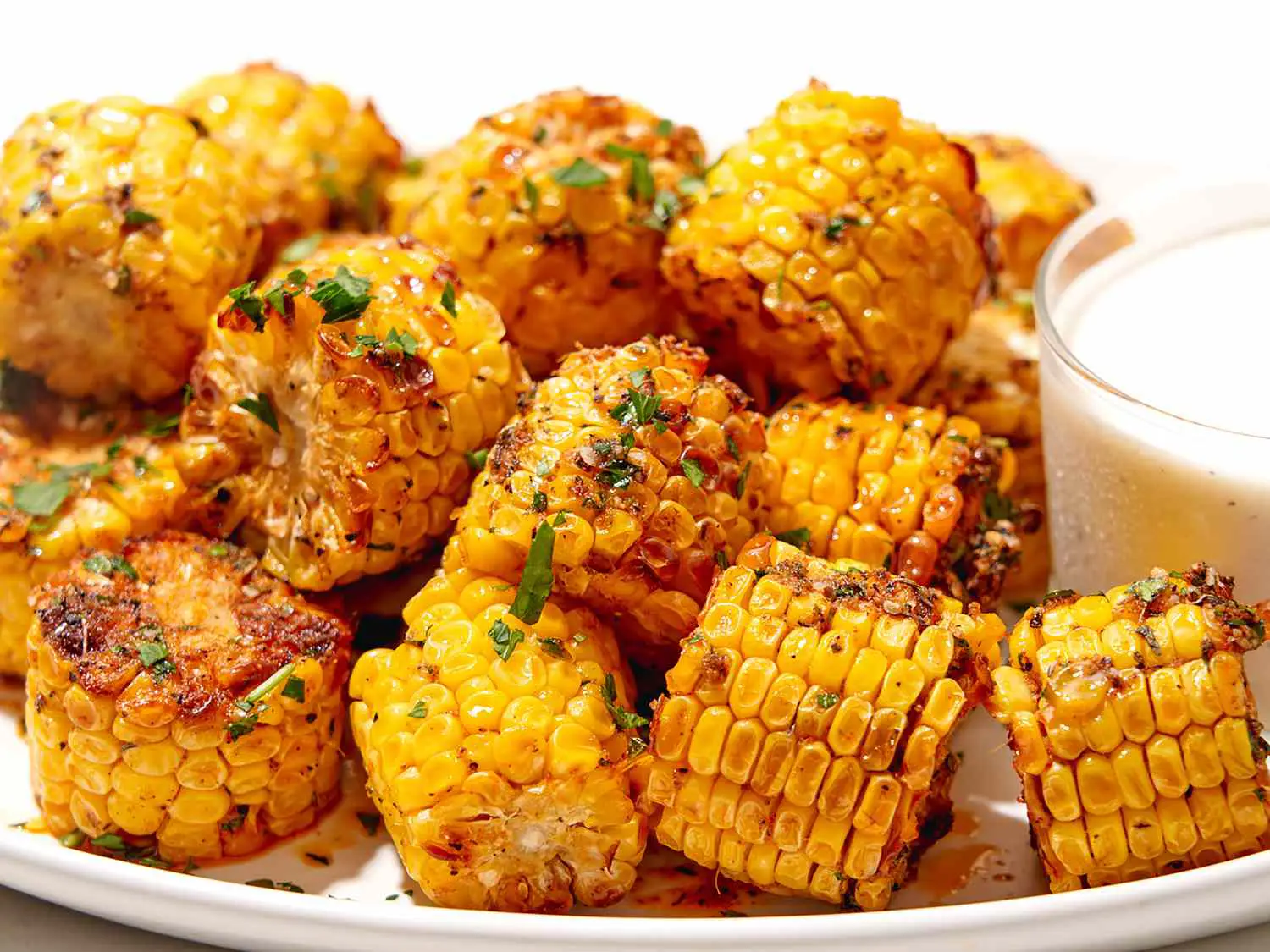 Copycat Wingstop Cajun corn seasoned with spicy Cajun butter and grilled to perfection.