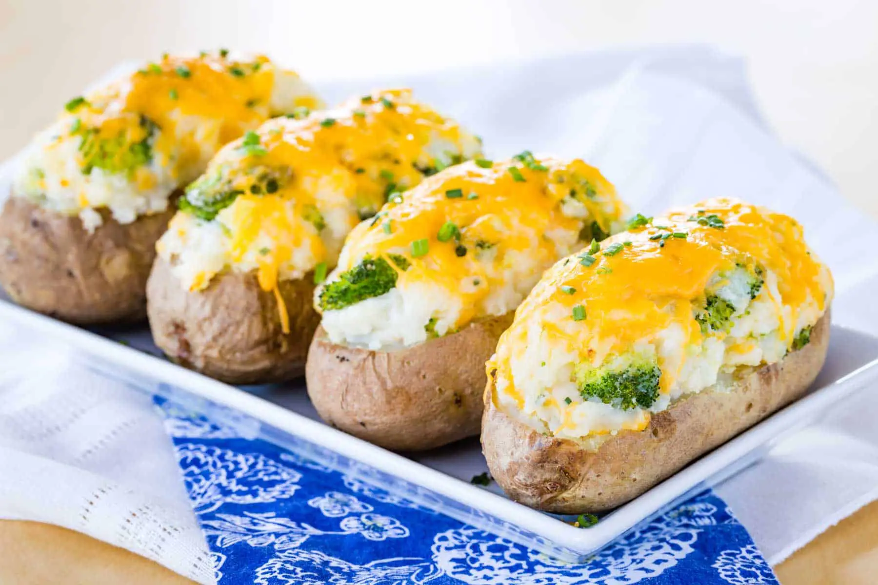 Twice-baked potatoes with cheddar cheese and broccoli, golden and crispy.