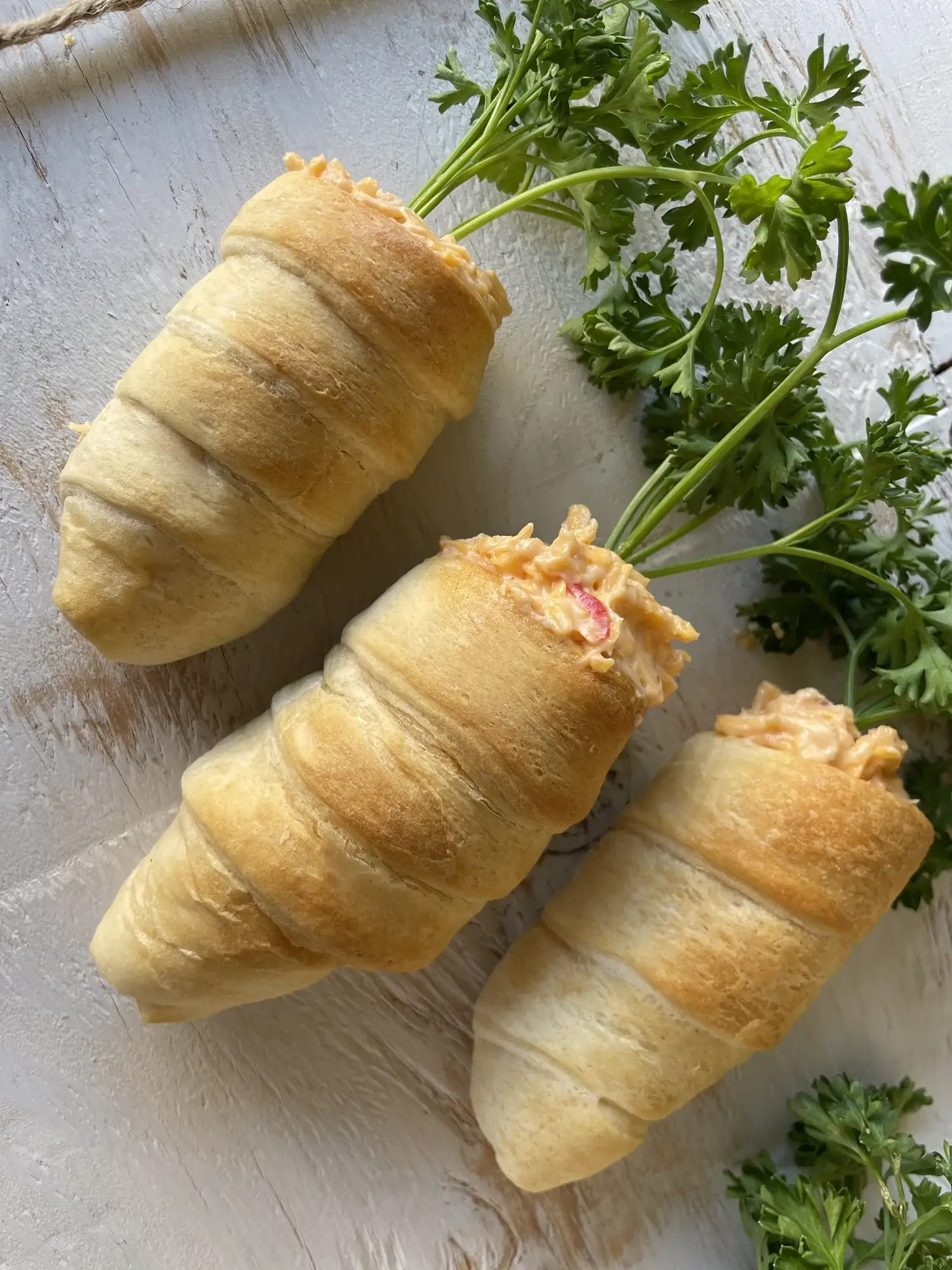 SEO-friendly alt text for a close-up image of the crescent roll carrots