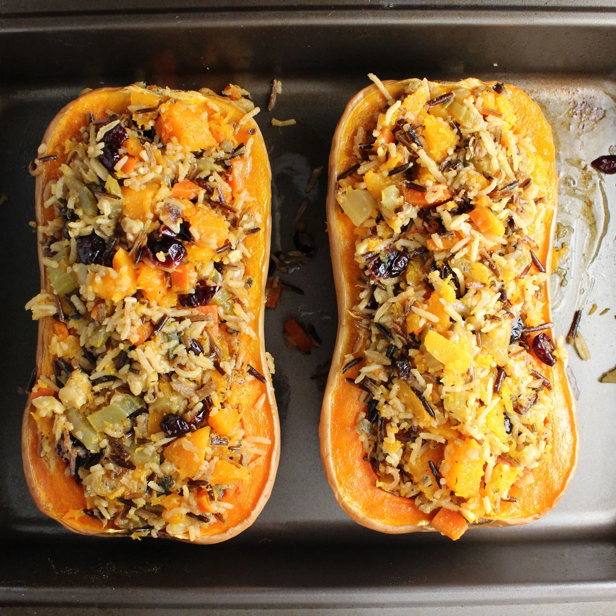 Roasted butternut squash served in a bowl with fresh herbs — a warm, healthy, and flavorful side dish.