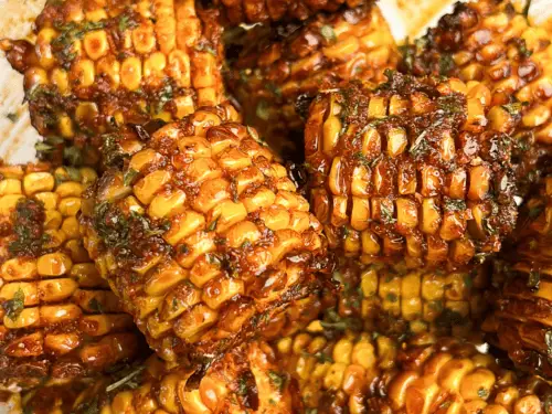 Wingstop-style Cajun corn seasoned with spicy butter and grilled to golden perfection.