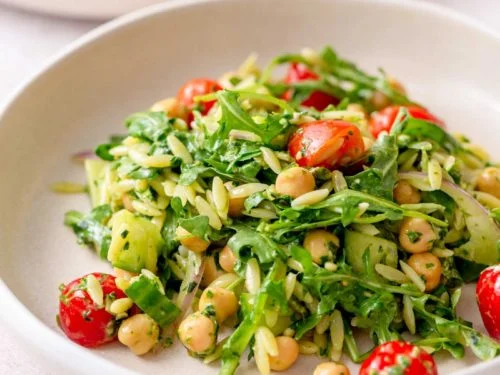 Easy healthy vegan chickpea pesto orzo salad with fresh vegetables and basil pesto – plant-based pasta salad recipe