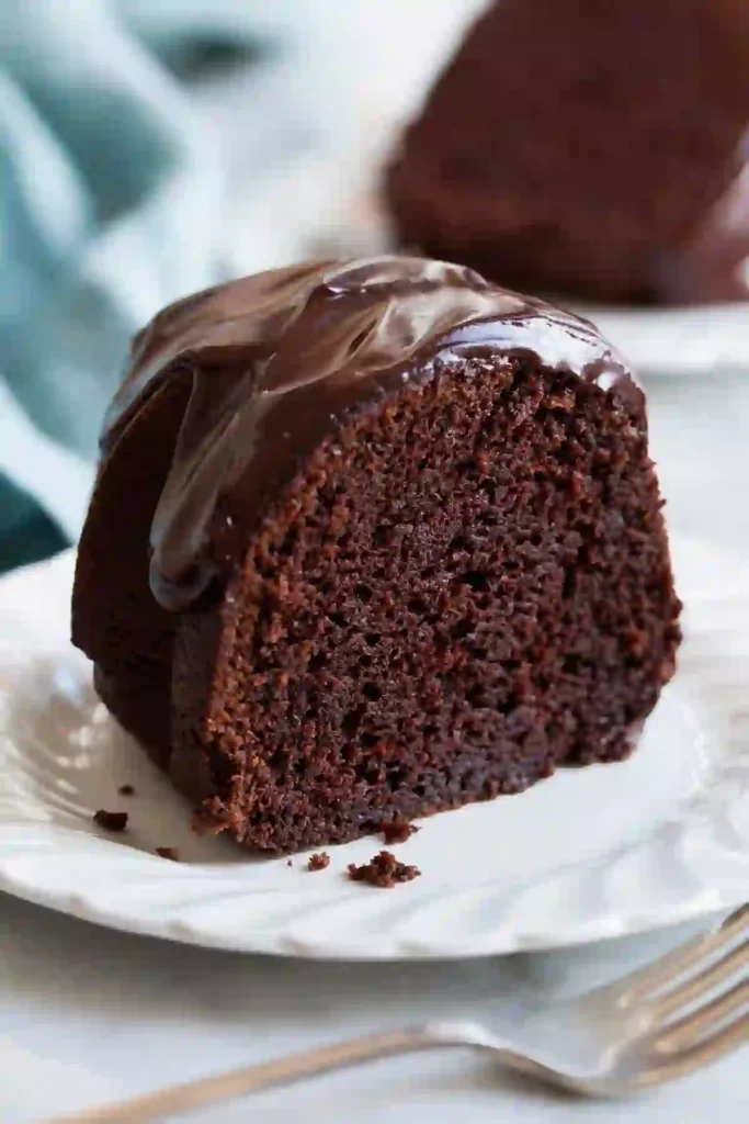 Rich chocolate Bundt cake with a smooth chocolate glaze and moist texture.