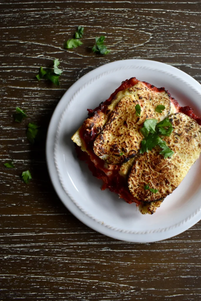 Baked pasta dish with melted cheese