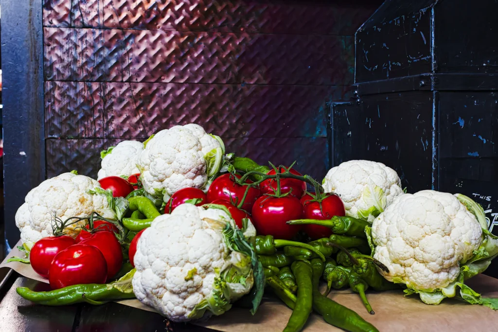 Fresh cauliflower and red bell peppers for roasted vegetable baked ziti