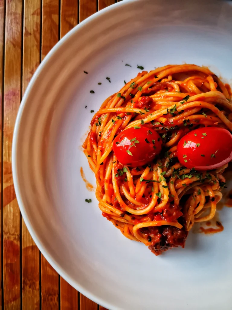 Pasta Bolognese served with Parmesan