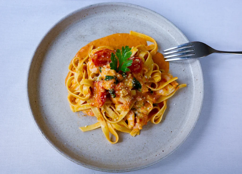 Cajun shrimp pasta served on a plate