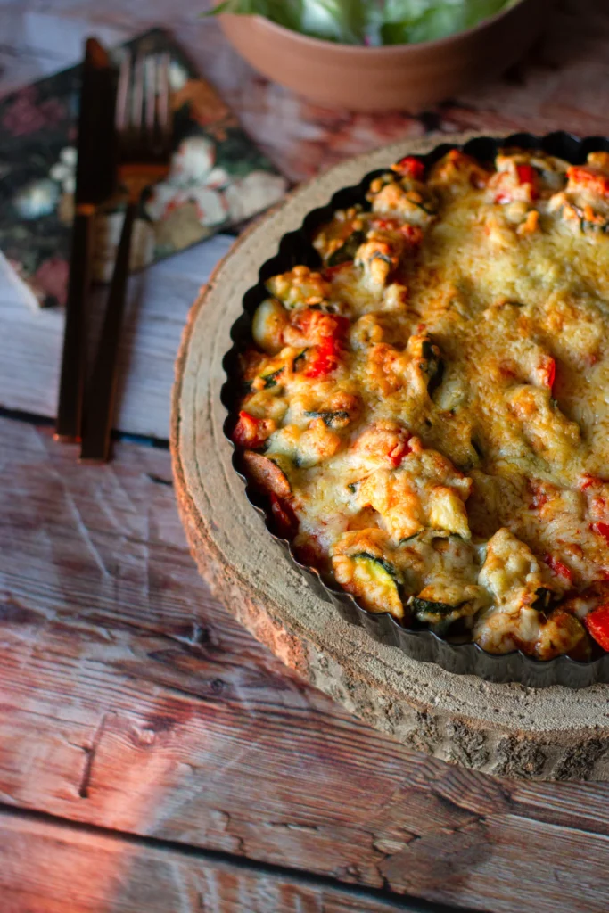 Cheesy baked vegetable casserole ready to serve