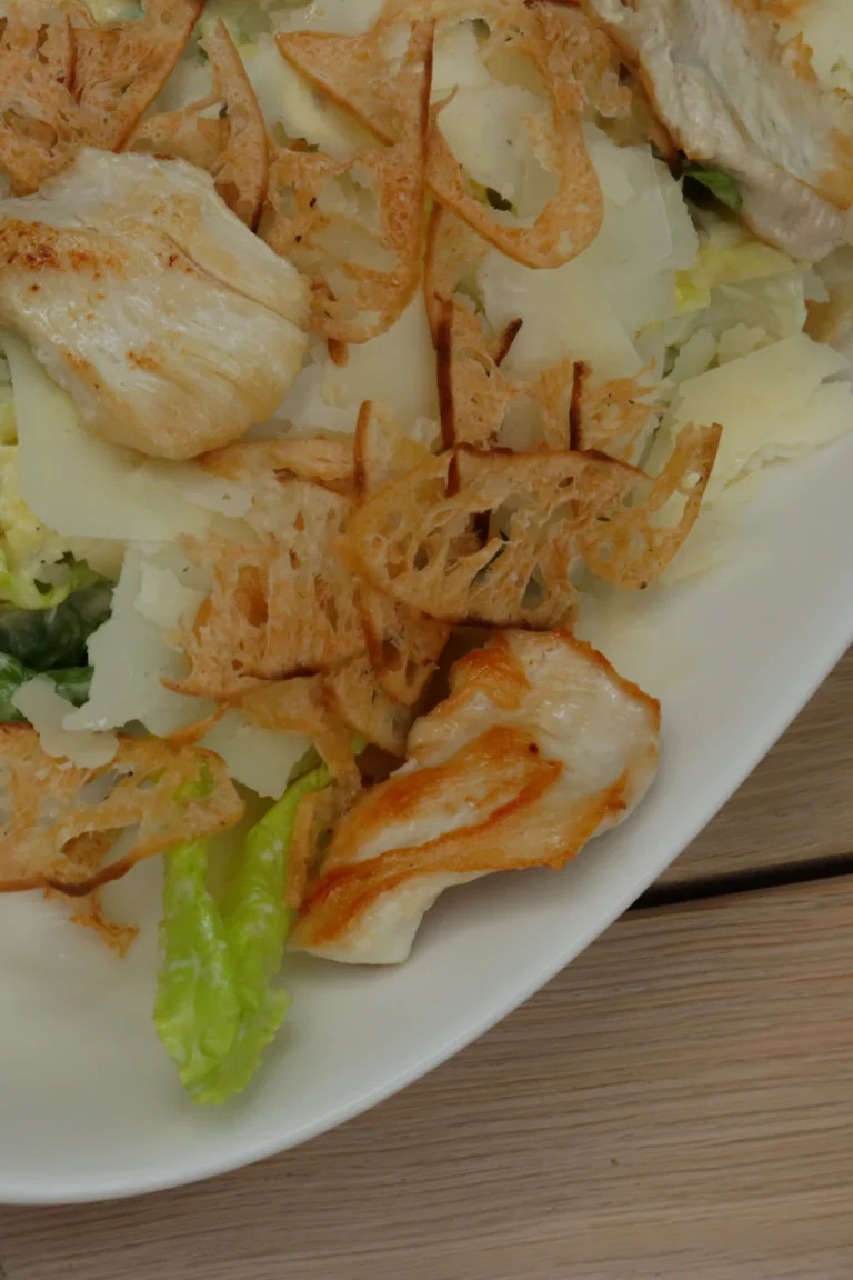 Chicken Caesar pasta salad with romaine, Parmesan and croutons