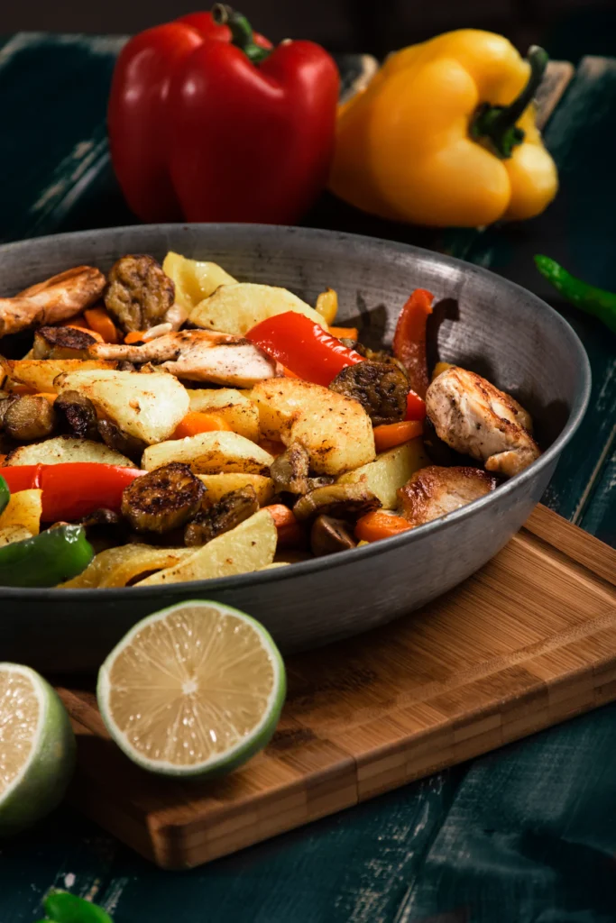 Chicken, peppers and onions cooking for burrito filling
