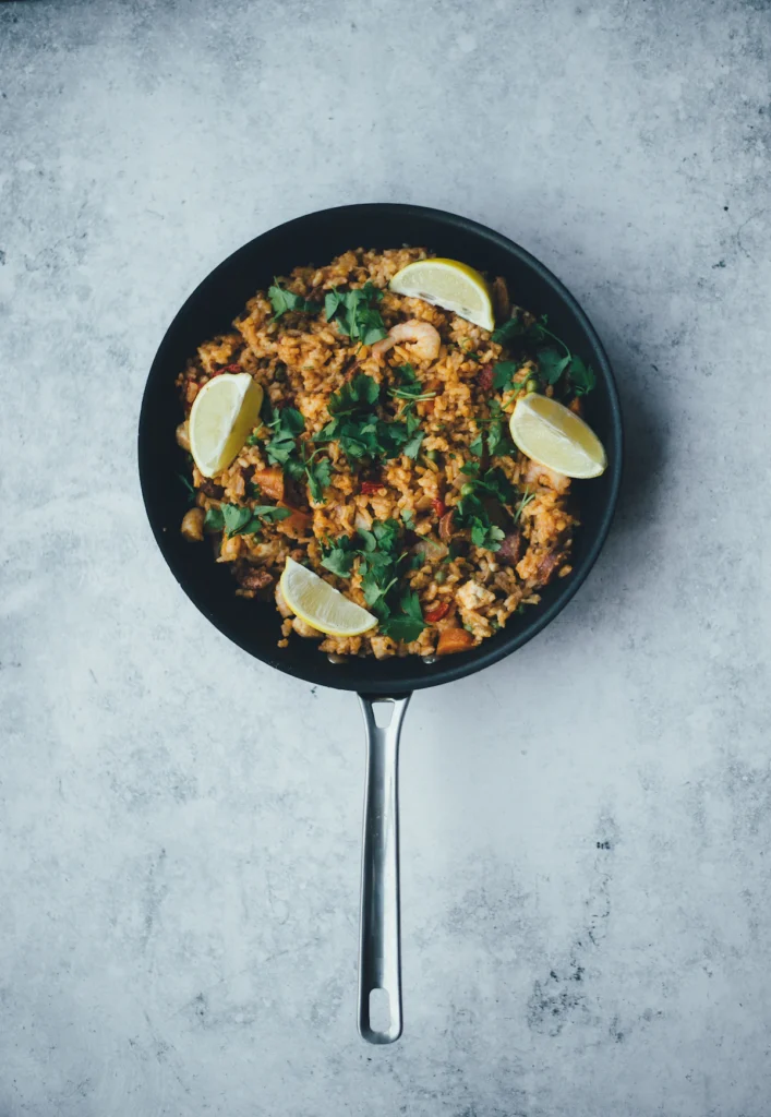Chicken and rice cooking in a pan