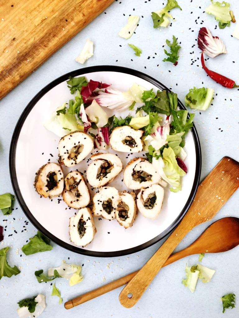 Sliced stuffed chicken roulade