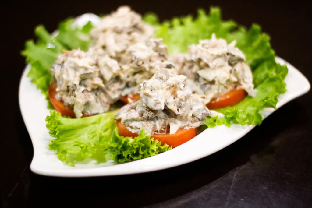 Creamy chicken salad served on crisp lettuce leaves