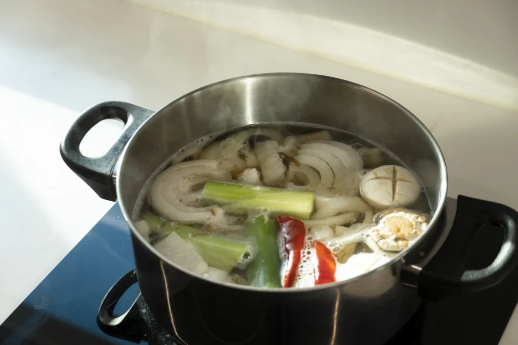 Pot of chicken and vegetable broth