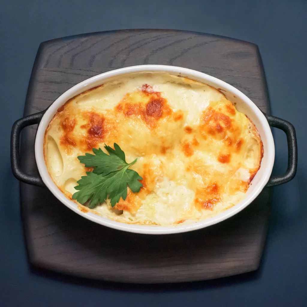 Creamy potato gratin in a baking dish