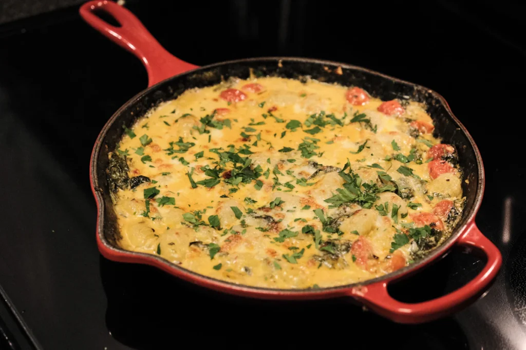 Creamy sauce simmering in a skillet