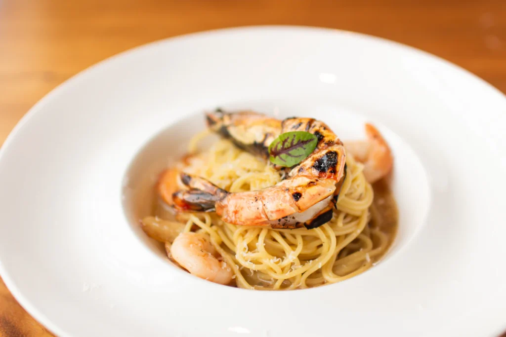 Garlic shrimp pasta served with parsley
