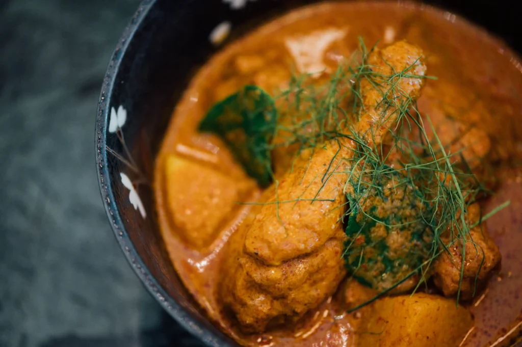Golden chicken curry in a bowl