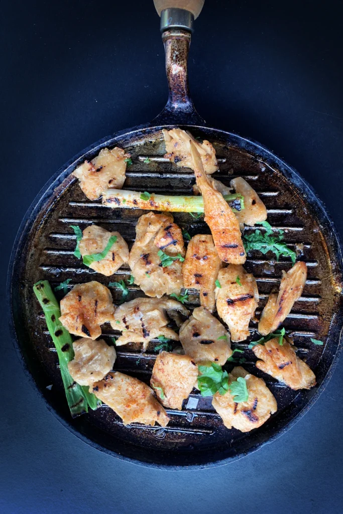 Grilled chicken bites fresh off the grill