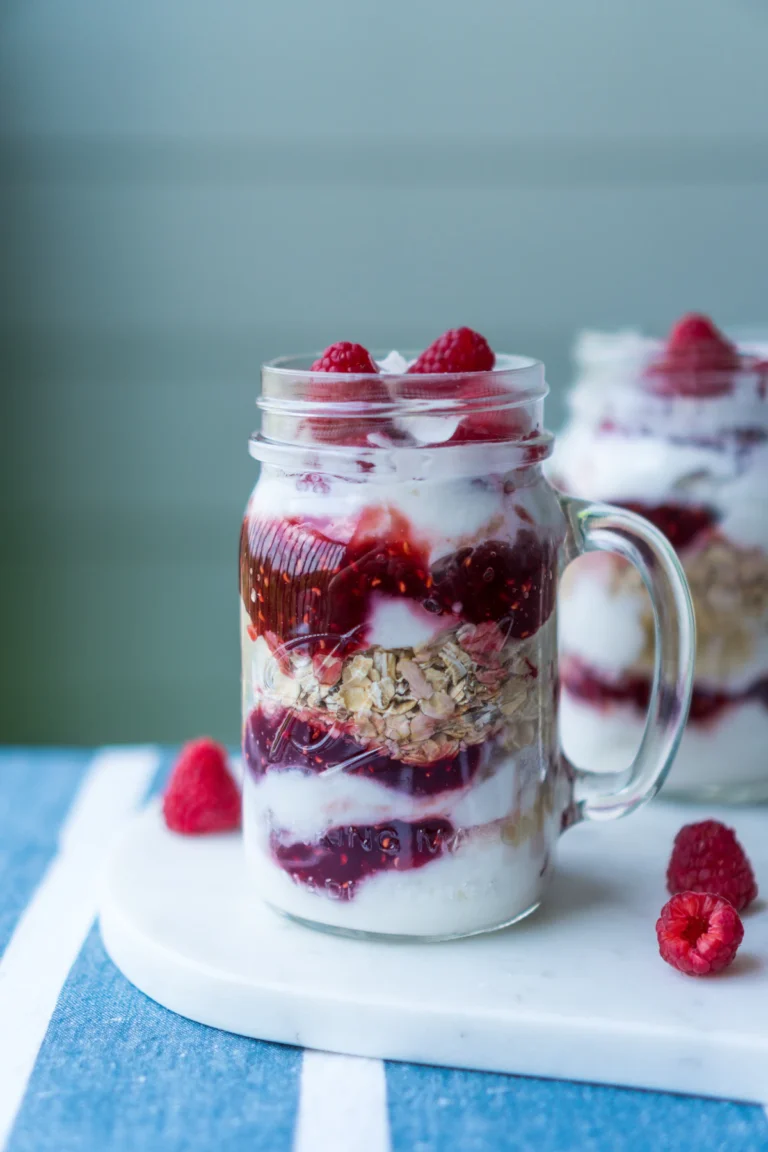 High protein overnight oats layered in jars with fresh berries
