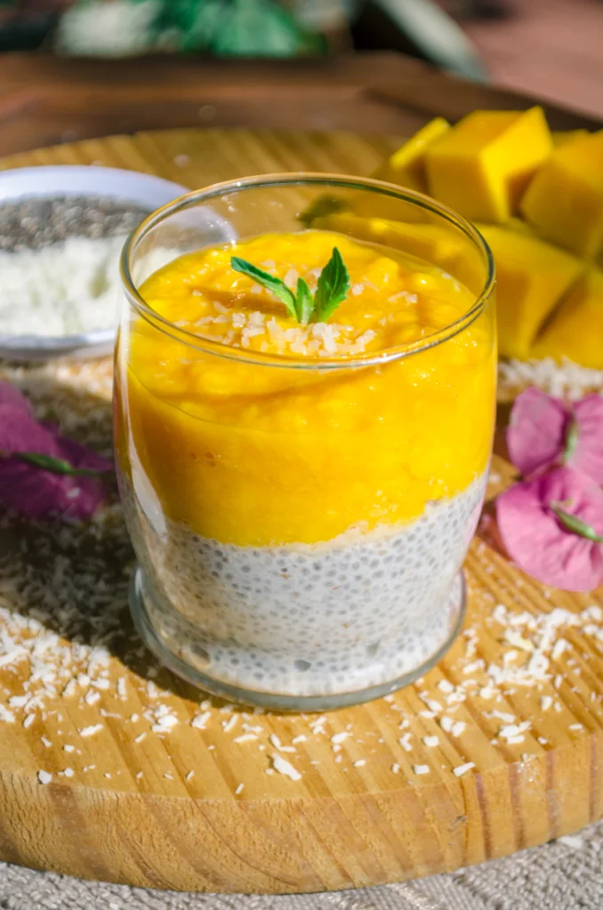 Mango chia pudding layered in a glass