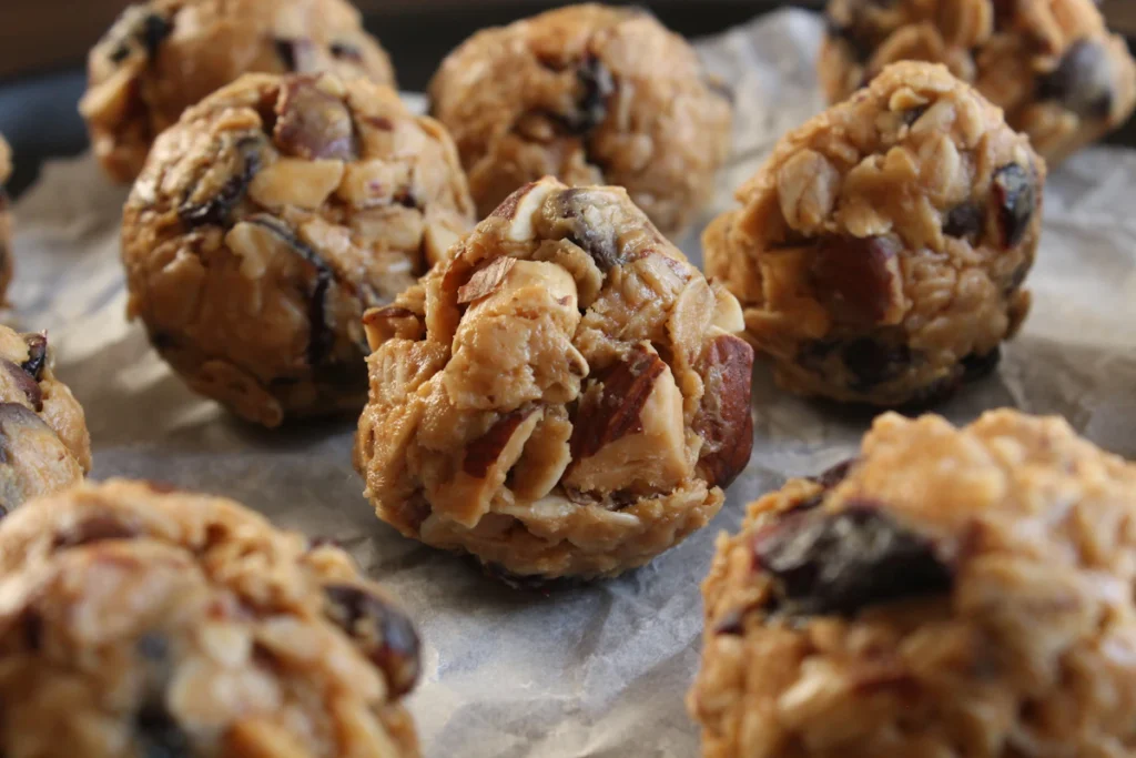 No-bake protein energy balls with oats and chocolate chips on a tray