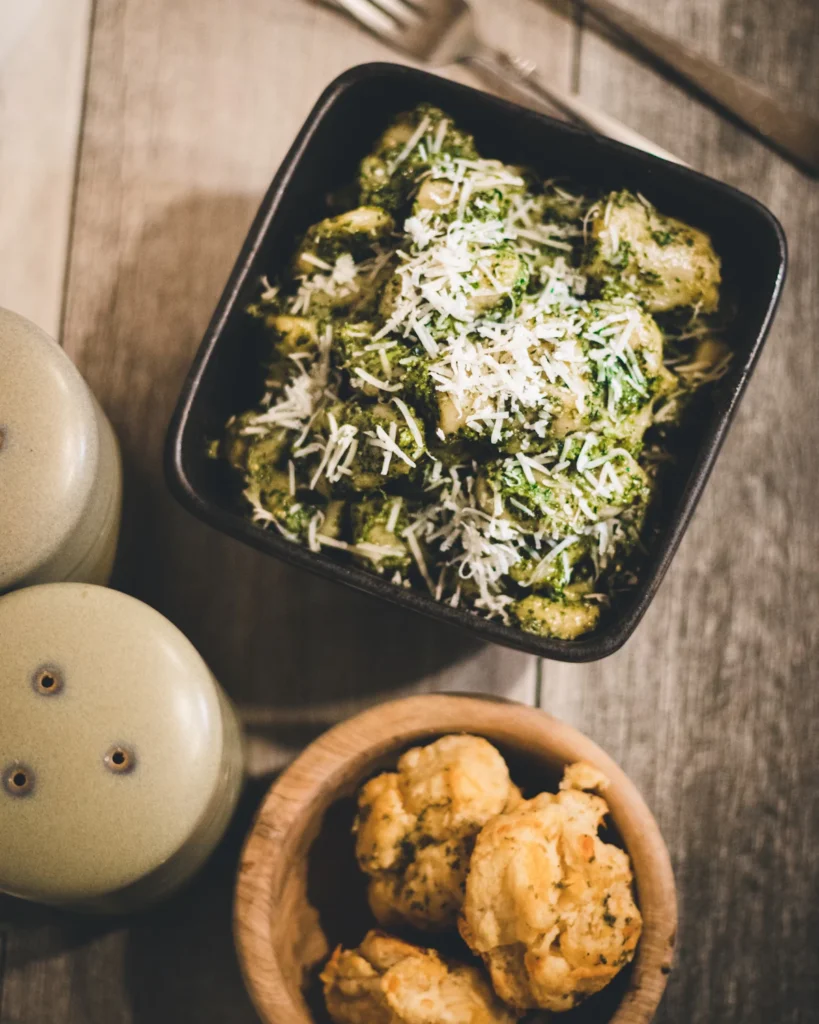 Pesto gnocchi dinner with fresh basil