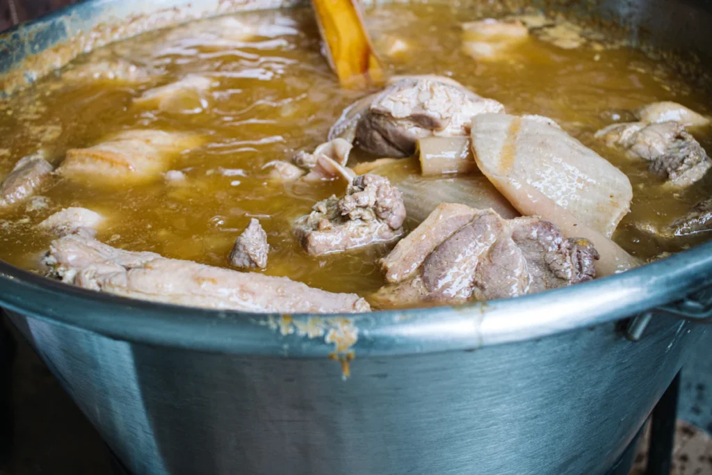 Tender poached chicken in broth
