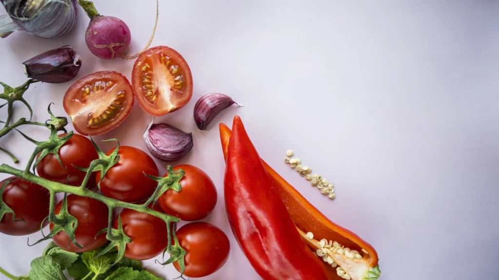 Fresh cherry tomatoes and red bell pepper for black bean quinoa salad