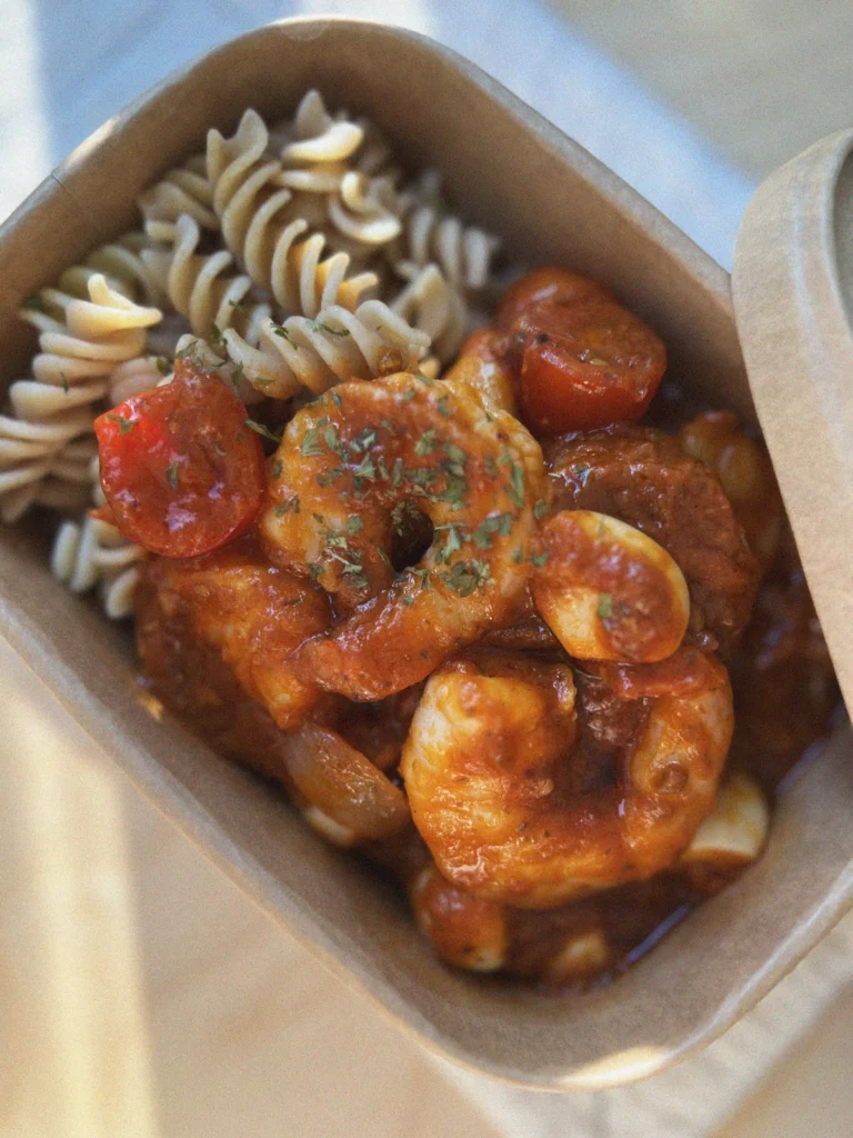Seared seasoned shrimp in a skillet