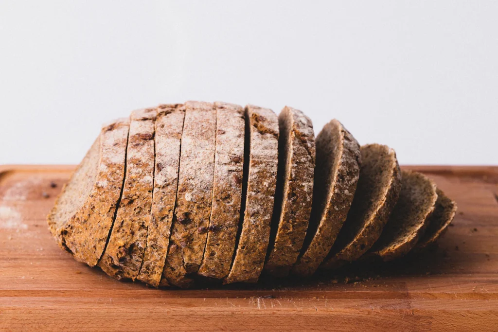 Loaf of homemade bread cut into slices