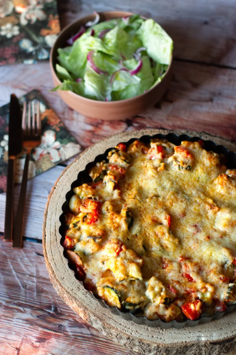 Baked squash and zucchini casserole with a golden cheesy Parmesan crust