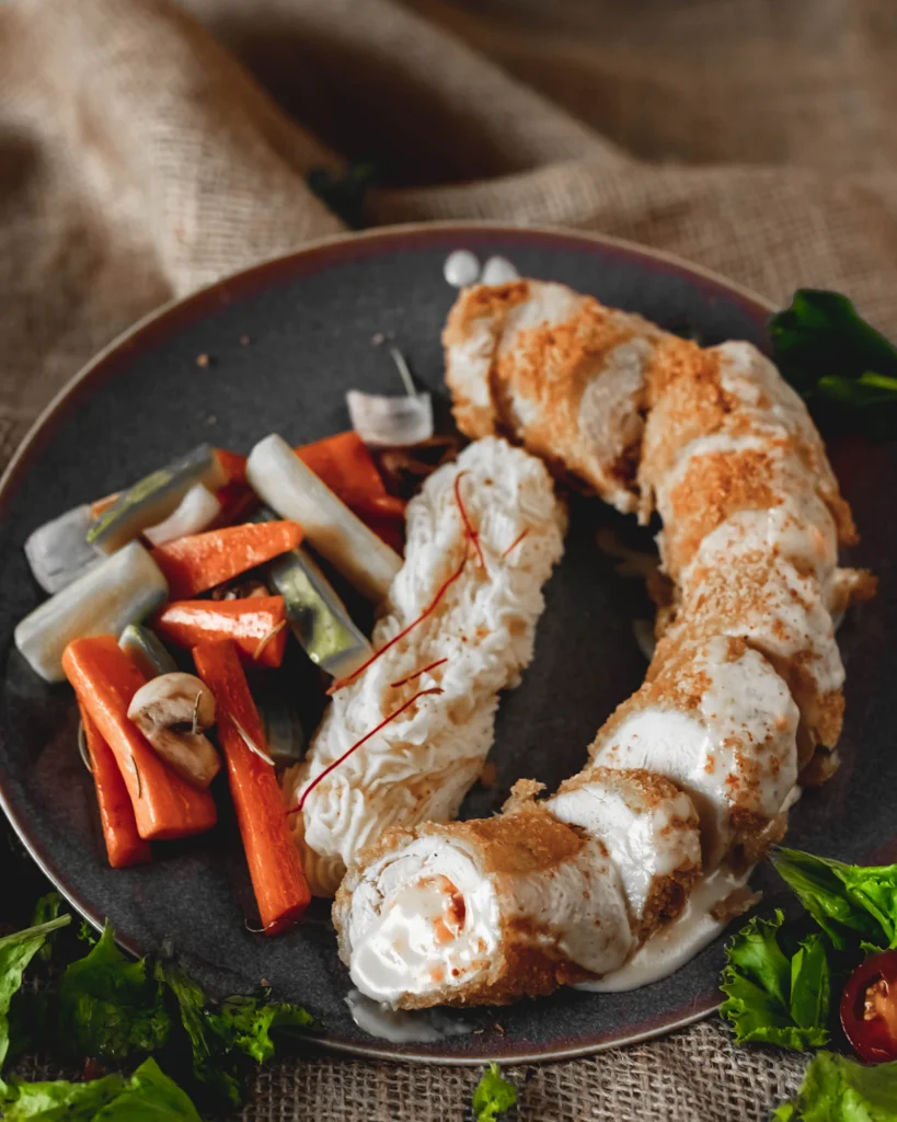 Stuffed chicken dinner ready to serve