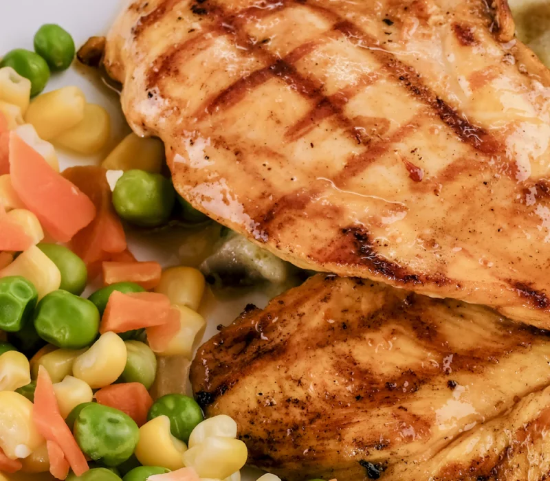 Seasoned air fryer chicken tenders with vegetables