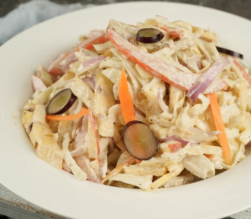 Creamy deviled egg pasta salad served on a plate