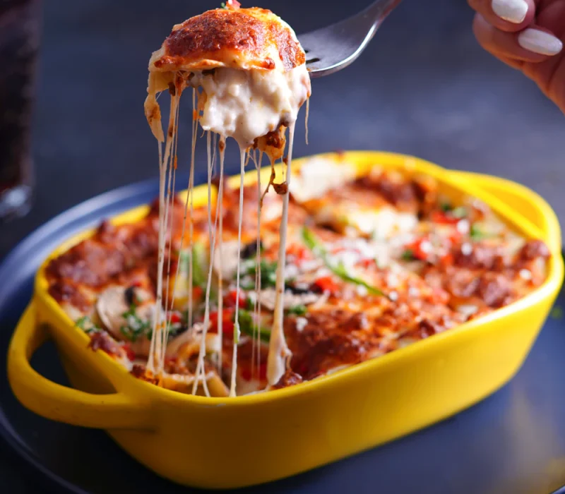 Cheesy baked pumpkin pesto stuffed shells