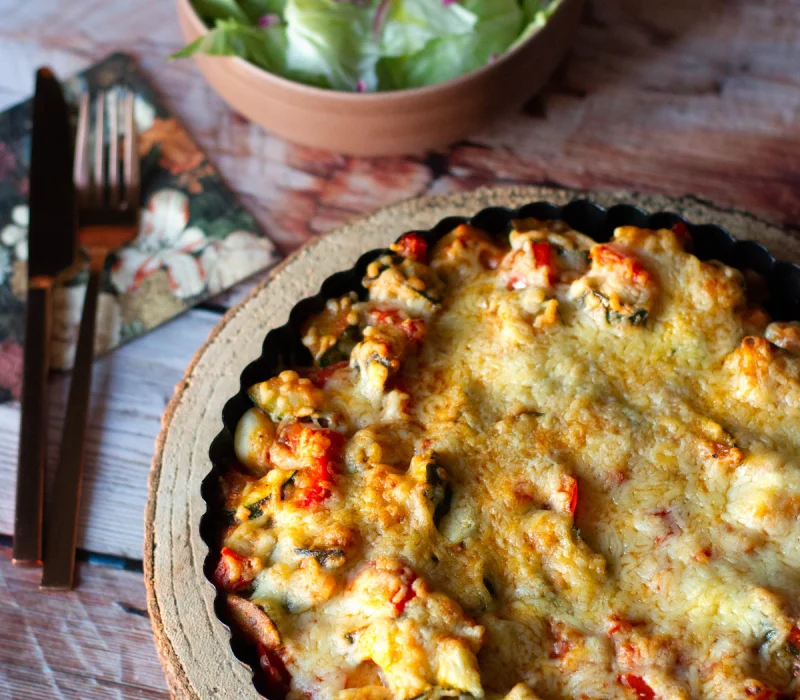 Baked squash and zucchini casserole with a golden cheesy Parmesan crust